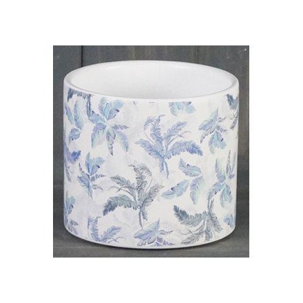 Covered with a faded blue toned leaf decal, this small ceramic pot is just perfect for placing in the home 