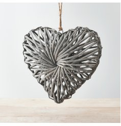 A rustic living rattan heart wreath with a grey washed finish and stylish jute string hanger.