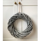 An small and simple round wreath set with a chic entwined rattan decal 