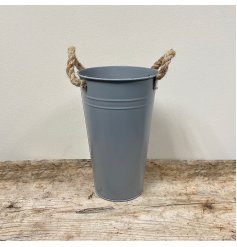 A rustic living flower bucket in grey. Complete with chunky rope handles.