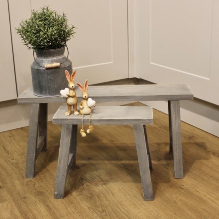   An assorted sized set of natural wooden potting benches, set with a charming soft grey tone to both 
