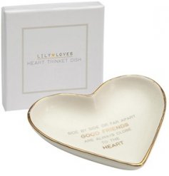 A sleek and simple heart shaped trinket dish complimented with a golden trim and added script text 