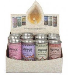 An assortment of pretty coloured and sweetly scented Aroma Oils packaged in quirky tins 