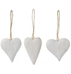 An assortment of 3 wooden hanging hearts, each with an attractive white washed finish.