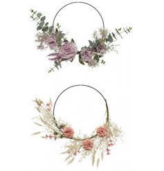 An assortment of 2 floral wreaths. Stunning artificial flowers in pink and purple colours.