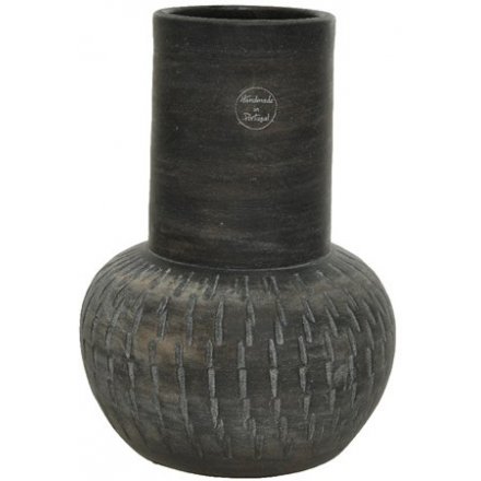 A beautifully carved handmade terracotta vase in an attractive dark brown colour. 