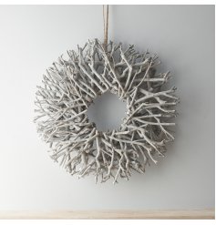 Make a statement with this stunning natural twig wreath with a grey washed finish.