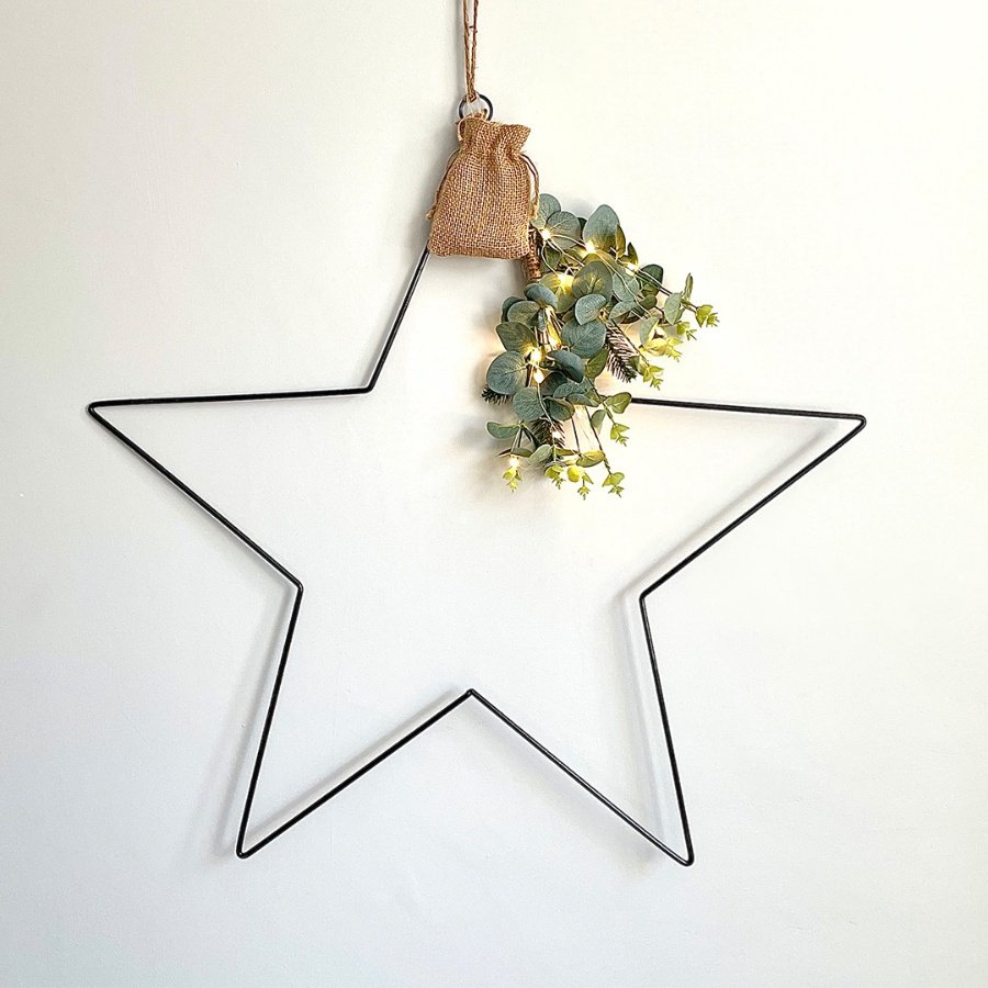  A beautiful and simple black wire star hanging decoration perfectly decorated with warm glowing LED lights