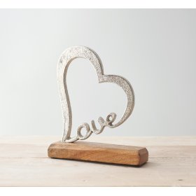 A charmingly simple natural wooden block based ornament