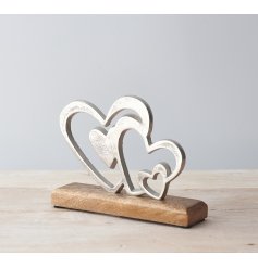  A charmingly simple natural wooden block based ornament, set with a rough silvered aluminium multi heart decal