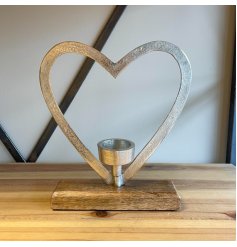 Sure to bring a delightful country charm feel to any home space, an aluminium Heart on wood base, complete with an added
