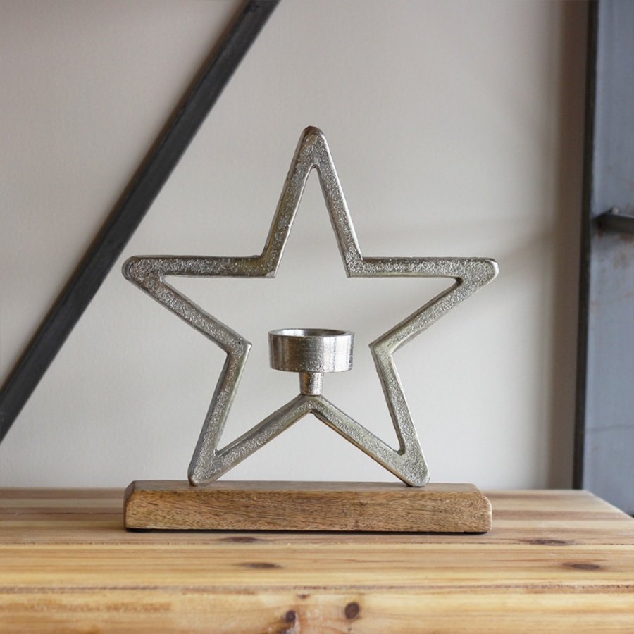 Sure to bring a delightful country charm feel to any home space, an aluminium star on wood base, complete with an added 