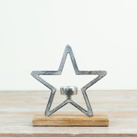 Sure to bring a delightful country charm feel to any home space, an aluminium star on wood base, complete with an added 
