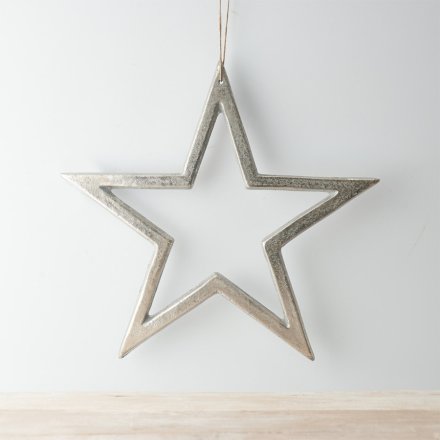 A rough luxe inspired star hanging decoration with a textured silver aluminium finish. Complete with a long jute string 