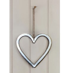  A small and simplistic ornamental heart set with a distressed feature and jute string hanger 
