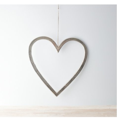 A rough luxe inspired heart decoration with a textured silver aluminium finish. Complete with a long jute string hanger.