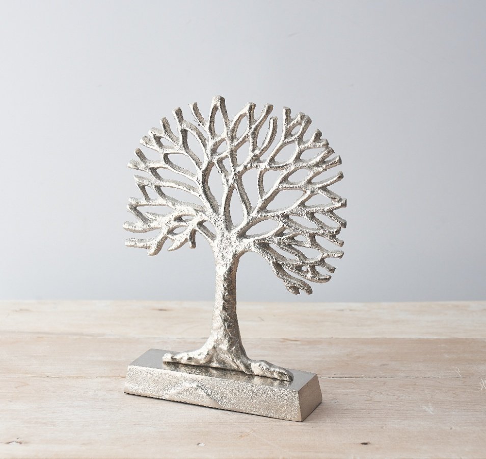 A beautifully distressed inspired ornamental tree of life decoration, set with a sleek silvered tone 