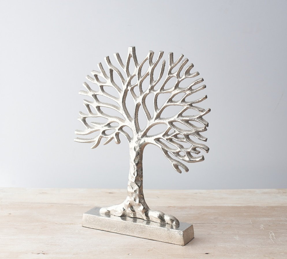 A beautifully distressed inspired ornamental tree of life decoration, set with a sleek silvered tone 