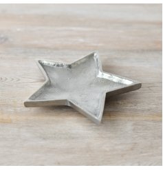 An overly distressed silver star plate, a perfect little ornament to add to your home 