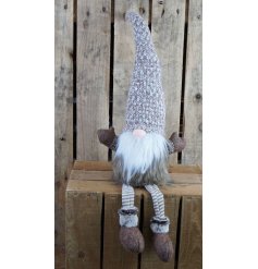 A charming little long bearded gonk with a high pointed hat and knitted fabric legs 