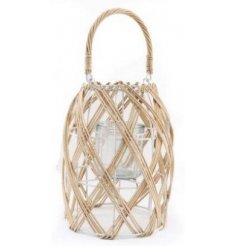 A charmingly simple woven lantern set with a neutral colour tone 