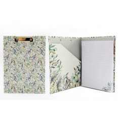  Decorated with a pretty green and blue toned floral print, this clipboard can open up to show lined pages for writing 
