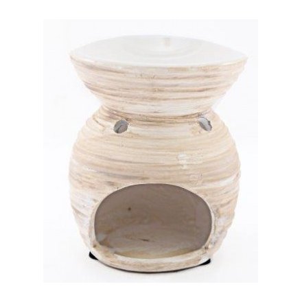 A curved oil burner set with a simple themed ribbed decal and neutral colour tone 