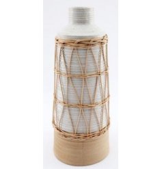 Part of the Natural Interior Range, a sleek and simple ribbed vase set with a woven rattan decal 
