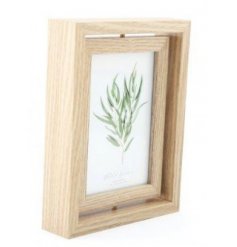  With its rotating sides, this display of 4x6 inch frames can show off up to 2 photographs 
