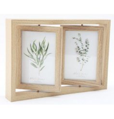   With its rotating sides, this display of 4x6 inch frames can show off up to 4 photographs 