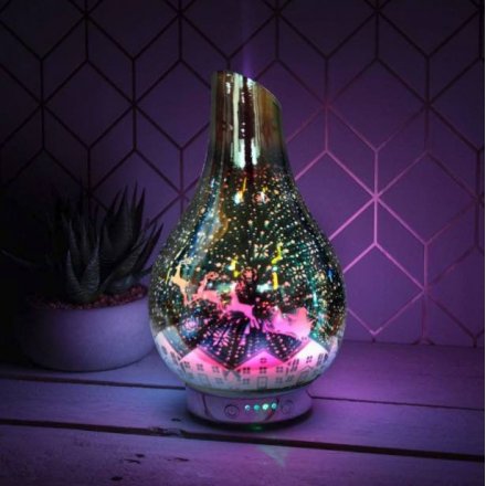 An LED Glass Humidifier featuring Santa's Flying Sleigh Scene 