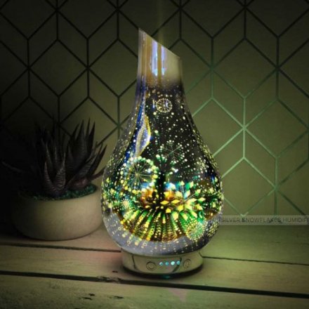 A warm glowing LED Glass Humidifier featuring a beautifully illustrated Snowflake scene