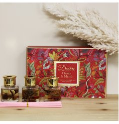 A charming set of reed diffusers filled with colourful floral features 