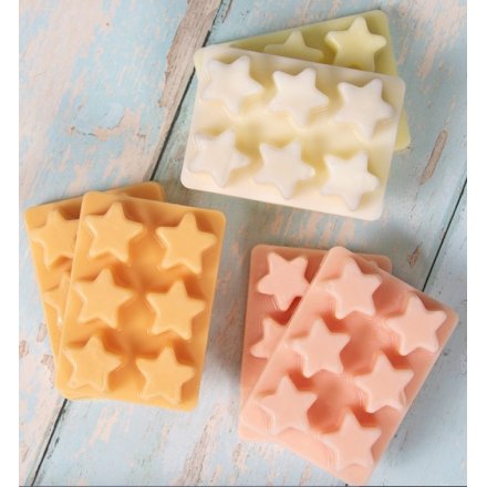 An assortment of individually packaged Wax Melt Packs in Star Shapes
