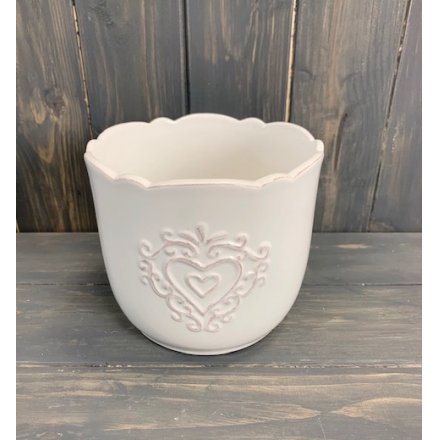 A sleek and simple inspired ceramic pot, beautifully decorated with a scalloped edge and embossed heart decal 