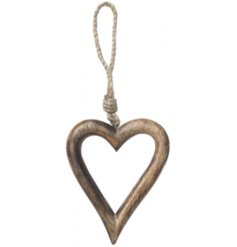 A hanging wooden open heart decoration