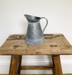 Set with an overly distressed coating, a large decorative zinc flower vase, sure to place perfectly in any home space wi