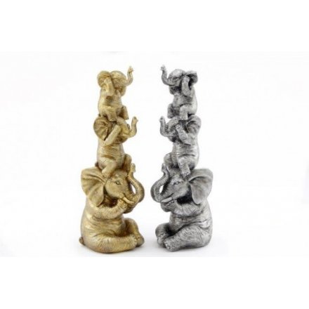 A stacked posed set of elephants with the traditional See, Hear and Speak No Evil poses 