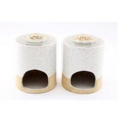  A ceramic based tlight holder set with a simplistic neutral tone and speckle glaze finish 