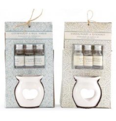  this assortment of sweetly scented oils and burner comes in pretty packaging 