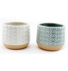  this assortment of dolomite planters are sure to bring a charming look to any space 