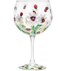 A beautifully decorated Balloon Gin Glass set with assorted hues, little red ladybirds and an abstract finish 