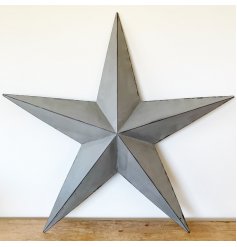 An Extra Large sized metal Barn Star set with a grey base tone and black lining 