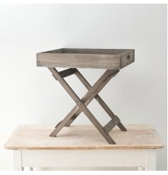 A stylish grey wooden table tray featuring a white washed tone and trendy look 