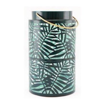   Set with a bold olive green tone and added gold handle, this metal lantern also features a cut out leaf design 