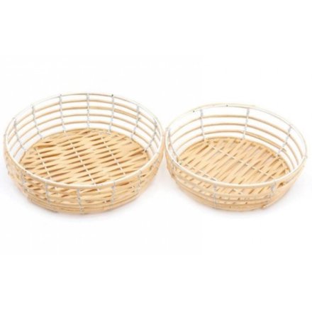 A set of woven bamboo bowls with added black wire framing 
