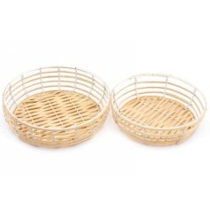  a set of bamboo woven bowls with added metal framing 