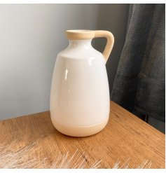   Set with a beautifully natural themed two tone colour palette, this decorative jug is sure to place perfectly in any h