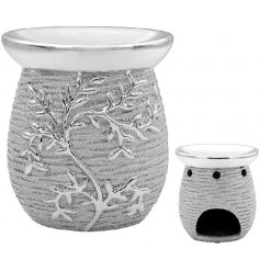 A sleek and stylish oil burner finished with a rough silver edging and climbing leaf decal 