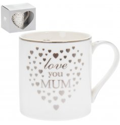 Ideal for gifting to any much Mum, a Fine China Mug with a pretty silver heart decal and scripted text 
